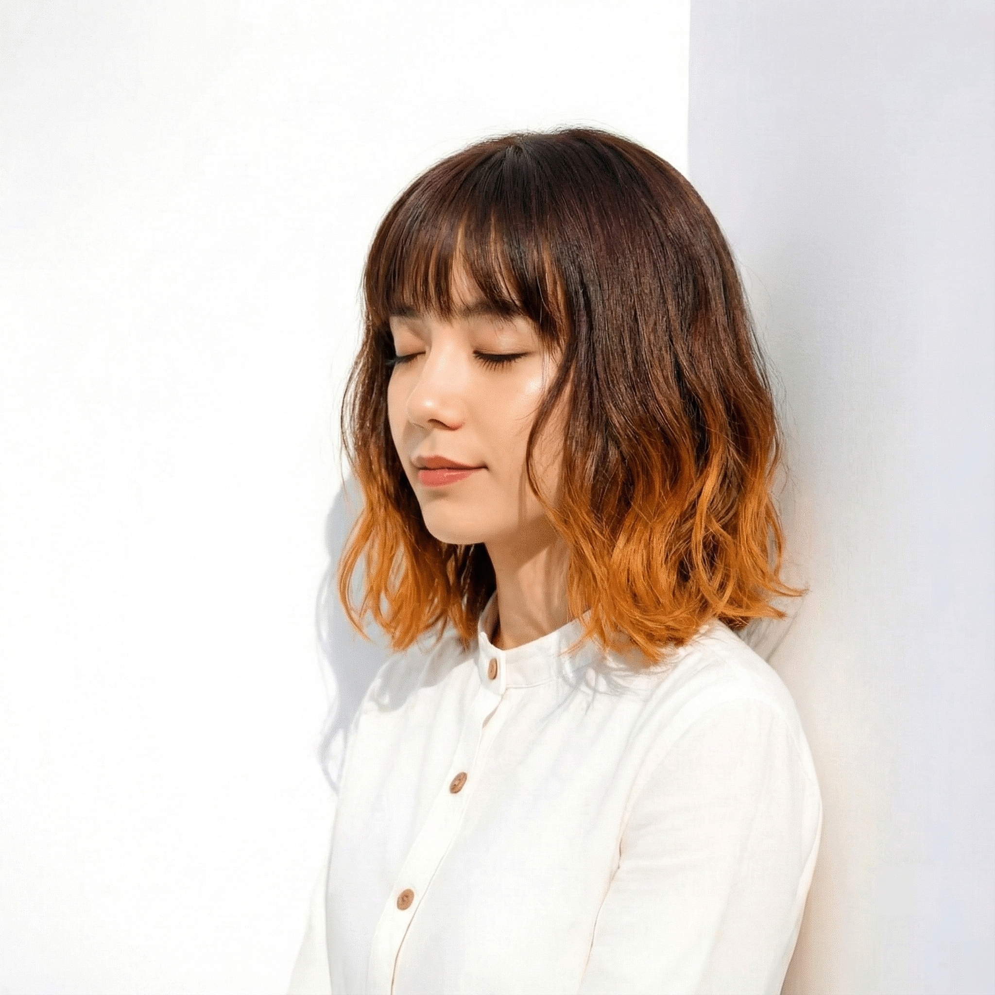 3. 毛先カラー×オレンジ：シルエットに動きを出す軽快なアクセント